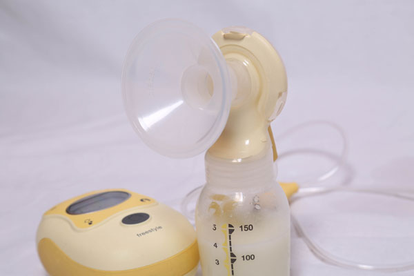 Expressed breast milk and pump