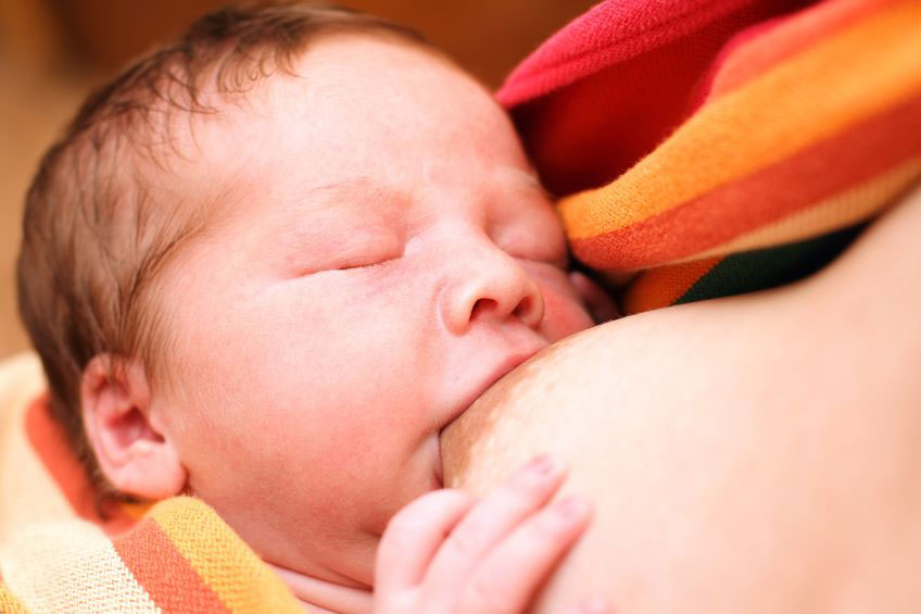 Close up of baby breastfeeding