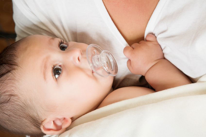 Giving a breastfed baby sales a dummy