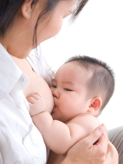 Asian baby breastfeeding