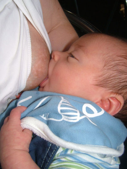 Deep latch, bottom lip turned out, tongue extended on Breastfeeding Support