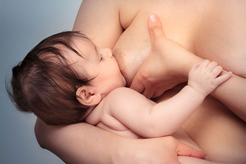 Mother breastfeeds skin to skin 