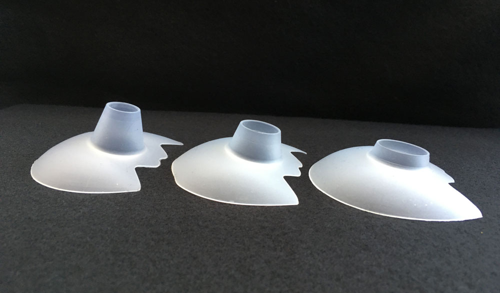 three sizes of open ended nipple shield