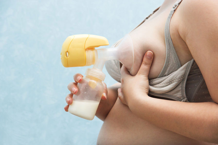 Massaging breast while pumping